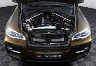 Подержанный автомобиль BMW X6 2013 года (9 фото)