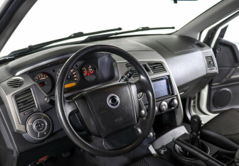 Подержанный автомобиль SsangYong Kyron 2014 года (7 фото)