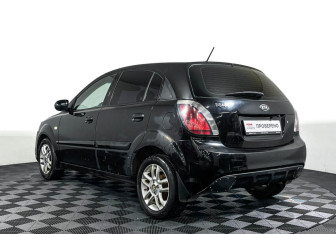 Подержанный автомобиль Kia Rio Hatchback 2010 года (7 фото)