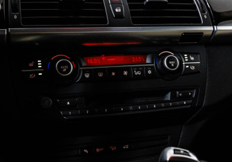 Подержанный автомобиль BMW X6 2013 года (18 фото)