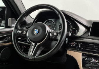 Подержанный автомобиль BMW X6 M 2016 года (15 фото)