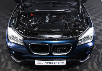 Подержанный автомобиль BMW X1 2012 года (9 фото)