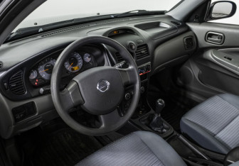 Подержанный автомобиль Nissan Almera Classic 2012 года (11 фото)