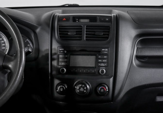 Подержанный автомобиль Kia Sportage 2009 года (13 фото)