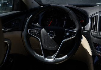 Подержанный автомобиль Opel Insignia Wagon 2014 года (12 фото)