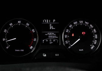 Подержанный автомобиль Skoda Rapid Liftback 2014 года (9 фото)