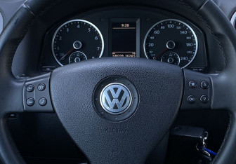 Подержанный автомобиль Volkswagen Tiguan 2010 года (15 фото)