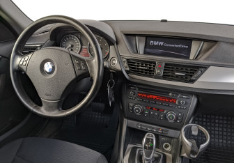 Подержанный автомобиль BMW X1 2014 года (26 фото)