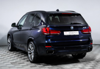 Подержанный автомобиль BMW X5 2015 года (7 фото)