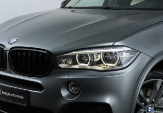 Подержанный автомобиль BMW X5 2014 года (23 фото)