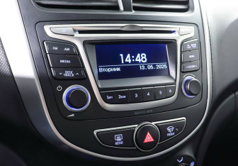 Подержанный автомобиль Hyundai Solaris Sedan 2014 года (17 фото)