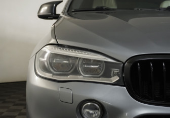 Подержанный автомобиль BMW X6 2016 года (27 фото)