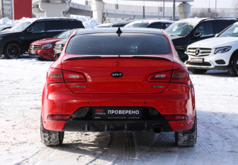 Подержанный автомобиль Kia Cerato Coupe 2013 года (6 фото)