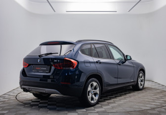 Подержанный автомобиль BMW X1 2014 года (5 фото)