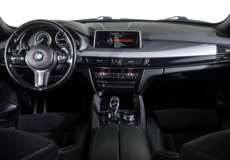 Подержанный автомобиль BMW X6 2016 года (12 фото)