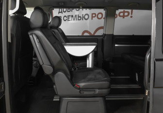 Подержанный автомобиль Volkswagen Multivan 2016 года (10 фото)