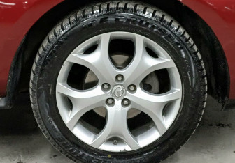 Подержанный автомобиль Mazda CX-7 2011 года (9 фото)