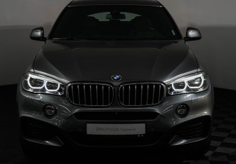 Подержанный автомобиль BMW X6 2017 года (23 фото)