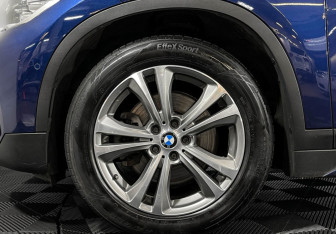 Подержанный автомобиль BMW X1 2015 года (7 фото)