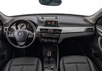 Подержанный автомобиль BMW X1 2018 года (14 фото)