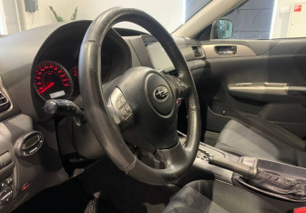 Подержанный автомобиль Subaru Impreza Hatchback 2007 года (11 фото)