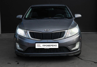 Подержанный автомобиль Kia Rio Hatchback 2013 года (2 фото)
