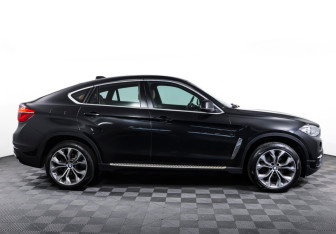 Подержанный автомобиль BMW X6 2014 года (4 фото)