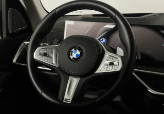 Подержанный автомобиль BMW X5 2025 года (15 фото)