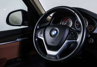 Подержанный автомобиль BMW X5 2016 года (13 фото)