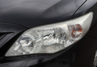 Подержанный автомобиль Toyota Corolla Sedan 2011 года (24 фото)