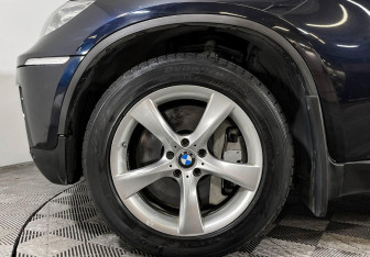 Подержанный автомобиль BMW X6 2013 года (7 фото)