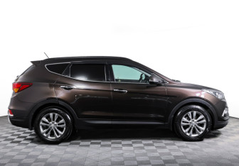 Подержанный автомобиль Hyundai Santa Fe 2016 года (4 фото)
