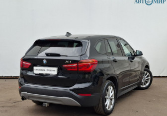 Подержанный автомобиль BMW X1 2015 года (5 фото)