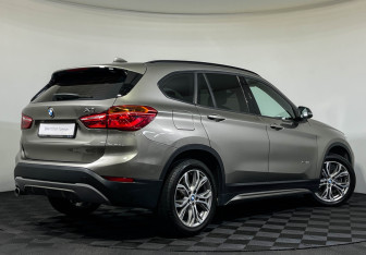 Подержанный автомобиль BMW X1 2017 года (2 фото)