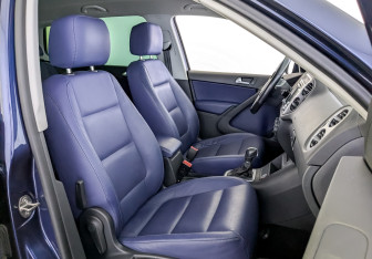 Подержанный автомобиль Volkswagen Tiguan 2016 года (23 фото)