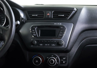 Подержанный автомобиль Kia Rio Sedan 2014 года (11 фото)