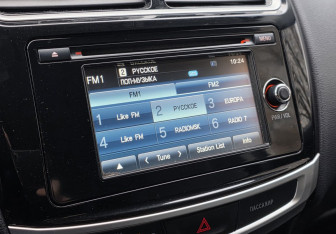 Подержанный автомобиль Mitsubishi ASX 2014 года (13 фото)