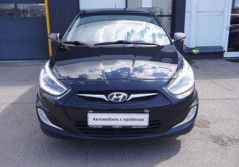 Подержанный автомобиль Hyundai Solaris Hatchback 2014 года (2 фото)