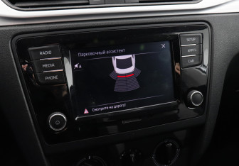 Подержанный автомобиль Skoda Rapid Liftback 2018 года (13 фото)