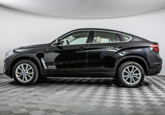 Подержанный автомобиль BMW X6 2016 года (8 фото)