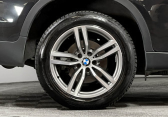 Подержанный автомобиль BMW X6 2015 года (7 фото)