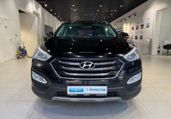 Подержанный автомобиль Hyundai Santa Fe 2015 года (2 фото)