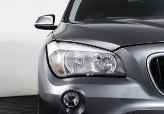 Подержанный автомобиль BMW X1 2014 года (22 фото)