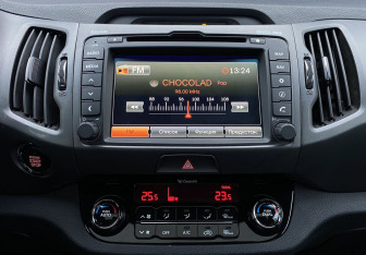 Подержанный автомобиль Kia Sportage 2012 года (19 фото)