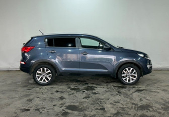 Подержанный автомобиль Kia Sportage 2014 года (8 фото)