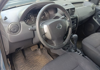 Подержанный автомобиль Nissan Terrano 2014 года (14 фото)
