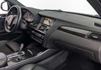 Подержанный автомобиль BMW X4 2015 года (13 фото)