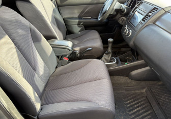Подержанный автомобиль Nissan Tiida Sedan 2010 года (9 фото)