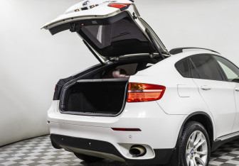 Подержанный автомобиль BMW X6 2009 года (17 фото)