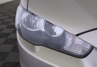 Подержанный автомобиль Mitsubishi Lancer Sedan 2010 года (11 фото)